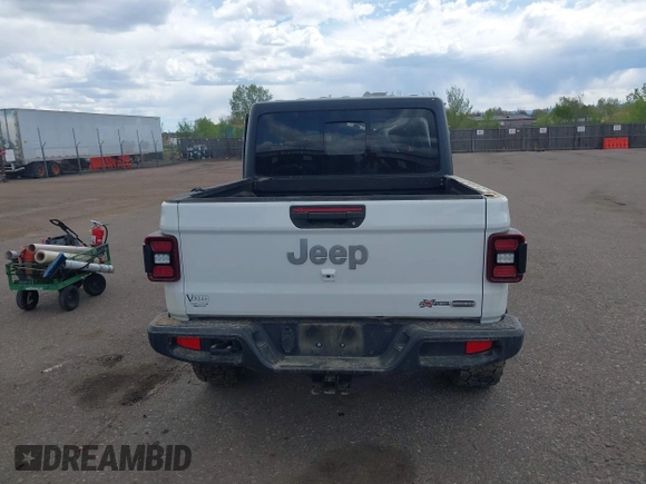 2021 Jeep Gladiator High Altitude with VIN 1C6HJTFG2ML567988, listed as a IAAI auction lot 42103576 with 74,849 mi miles and . Bid and sale history available at DreamBid. Image 16.