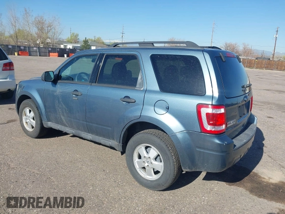 2011 Ford Escape XLT with VIN 1FMCU0D79BKB52998, listed as a IAAI auction lot 41980154 with 175,375 mi miles. Bid and sale history available at carsss.com. Image 3.