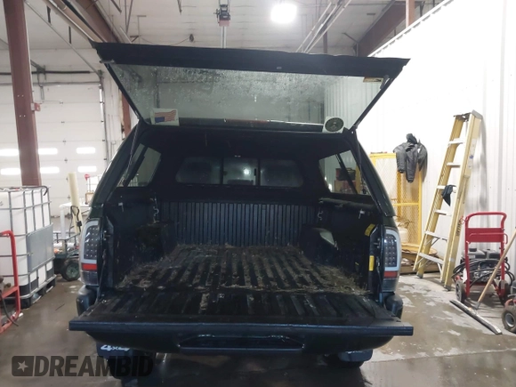 2012 Toyota Tacoma with VIN 3TMLU4EN2CM094154, listed as a IAAI auction lot 41322227 with 270,712 mi miles and . Bid and sale history available at DreamBid. Image 12.
