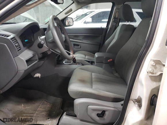 2005 Jeep Grand Cherokee Laredo with VIN 1J4HR48N75C679152, listed as a Copart auction lot 46933765 with 221,299 mi miles and Salvage Title. Bid and sale history available at carsss.com. Image 7.