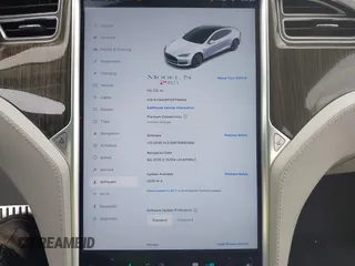 2013 Tesla Model S Performance z VIN 5YJSA1DP1DFP16609, wystawiony jako IAAI lot #42458995 z przebiegiem 110 722 mil mil oraz . Historia ofert i sprzedaży dostępna na DreamBid. Obrazek 18.