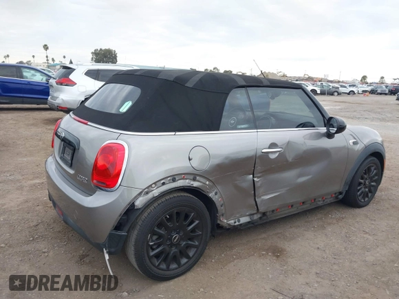 2016 MINI Convertible z VIN WMWWG5C51G3A81075, wystawiony jako IAAI lot #41681717 z przebiegiem 54 956 mil mil oraz . Historia ofert i sprzedaży dostępna na DreamBid. Obrazek 6.