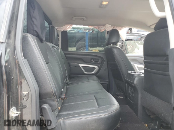 2016 Nissan Titan SL z VIN 1N6BA1F22GN504550, wystawiony jako Copart lot #56616955 z przebiegiem 176 020 mil mil oraz Szkoda całkowita • Salvage title. Historia ofert i sprzedaży dostępna na DreamBid. Obrazek 10.