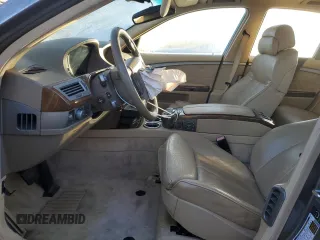 2006 BMW 7 Series 750i with VIN WBAHL83596DT03728, listed as a Copart auction lot 87855795 with 127,513 mi miles and Salvage title. Bid and sale history available at DreamBid. Image 7.