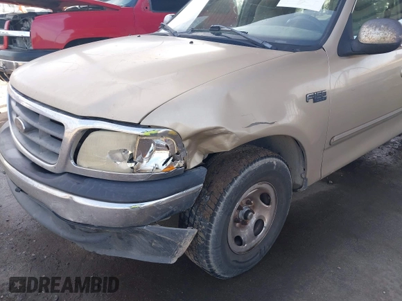 2000 Ford F-150 XL with VIN 1FTZX1723YKB48613, listed as a IAAI auction lot 41611851 with 187,450 mi miles. Bid and sale history available at carsss.com. Image 6.