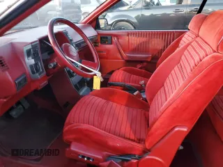 1985 Chevrolet Cavalier with VIN 1G1JE67W1F7185395, listed as a Copart auction lot 80670104 with 5,776 mi miles and Clean Title. Bid and sale history available at DreamBid. Image 7.