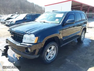 2007 Jeep Grand Cherokee Laredo with VIN 1J8GR48K67C523705, listed as a IAAI auction lot 41774281 with 215,572 mi miles. Bid and sale history available at carsss.com. Image 21.