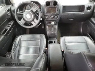 2016 Jeep Patriot High Altitude with VIN 1C4NJRFBXGD595443, listed as a Copart auction lot 59985755 with 171,776 mi miles and Salvage title. Bid and sale history available at DreamBid. Image 8.