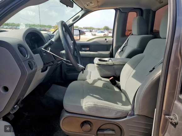 2007 Ford F-150 XL with VIN 1FTRF12247KB92953, listed as a Copart auction lot 61055325 with 79,947 mi miles and Salvage title. Bid and sale history available at DreamBid. Image 7.