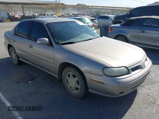 1999 Oldsmobile Cutlass GL z VIN 1G3NB52M9X6313424, wystawiony jako IAAI lot #42345276 z przebiegiem 191 527 mil mil oraz . Historia ofert i sprzedaży dostępna na DreamBid. Obrazek 1.
