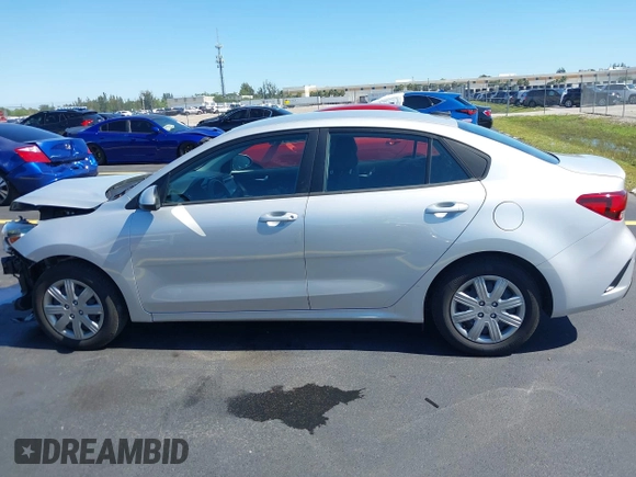 2023 Kia Rio S z VIN 3KPA24AD4PE592446, wystawiony jako IAAI lot #42244022 z przebiegiem 13 759 mil mil oraz . Historia ofert i sprzedaży dostępna na DreamBid. Obrazek 15.