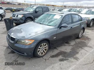 2006 BMW 3 Series 325i with VIN WBAVB13536KX69406, listed as a IAAI auction lot 41925948 with 123,734 mi miles. Bid and sale history available at carsss.com. Image 2.