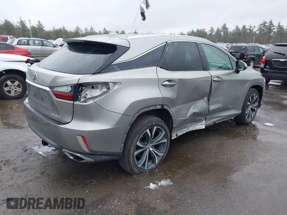 2017 Lexus RX 350 with VIN 2T2BZMCA1HC125449, listed as a IAAI auction lot 41966133 with 102,788 mi miles and . Bid and sale history available at DreamBid. Image 4.