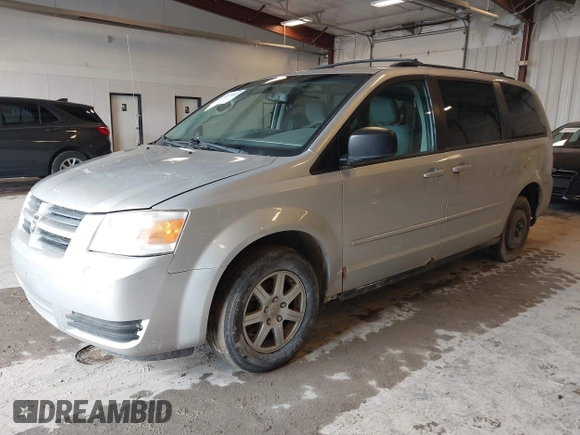 2010 Dodge Grand Caravan SE with VIN 2D4RN4DE8AR173359, listed as a IAAI auction lot 42170689 with 246,553 mi miles and . Bid and sale history available at DreamBid. Image 2.