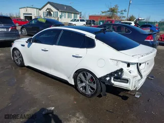 2017 Kia Optima SX with VIN 5XXGW4L20HG121574, listed as a IAAI auction lot 41586918 with 101,517 mi miles. Bid and sale history available at carsss.com. Image 3.