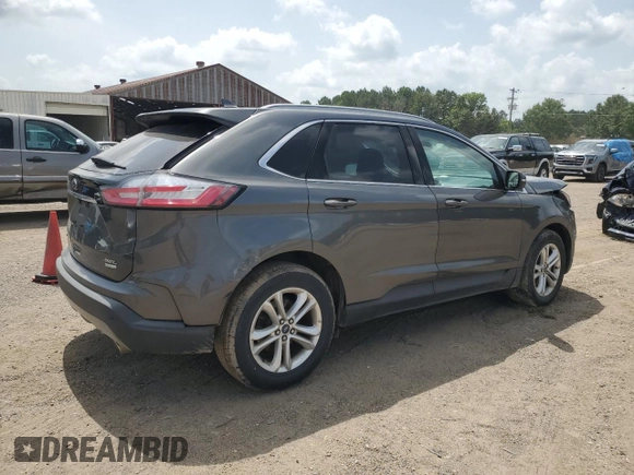 2020 Ford Edge SEL с VIN 2FMPK3J92LBA30123, выставлен на аукционе Copart как лот 63192805 с пробегом 119 534 миль миль и Списание • Salvage title. История ставок и продаж доступна на DreamBid. Изображение 3.