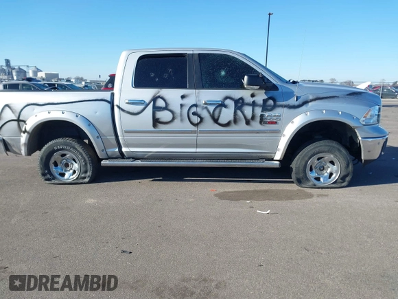 2014 Ram 1500 Big Horn with VIN 1C6RR7LM6ES332385, listed as a IAAI auction lot 41276004 with 190,863 mi miles and . Bid and sale history available at DreamBid. Image 13.