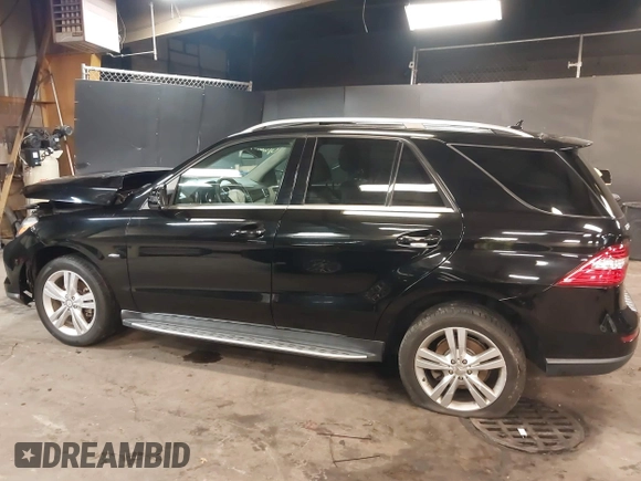 2012 Mercedes-Benz M ML 350 with VIN 4JGDA5HB7CA026607, listed as a IAAI auction lot 41687785 with 89,161 mi miles. Bid and sale history available at carsss.com. Image 15.