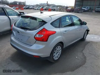 2012 Ford Focus SE with VIN 1FAHP3K27CL185977, listed as a IAAI auction lot 41674498 with 140,312 mi miles. Bid and sale history available at carsss.com. Image 4.