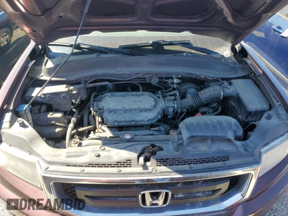 2009 Honda Ridgeline RT z VIN 5FPYK16239B106377, wystawiony jako Copart lot #70242764 z przebiegiem 187 760 mil mil oraz Czysty tytuł • Clean title. Historia ofert i sprzedaży dostępna na DreamBid. Obrazek 11.