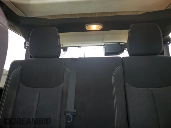 2013 Jeep Wrangler Unlimited Rubicon with VIN 1C4BJWFG5DL661282, listed as a Copart auction lot 57471035 with 128,400 mi miles and Salvage title. Bid and sale history available at DreamBid. Image 10.