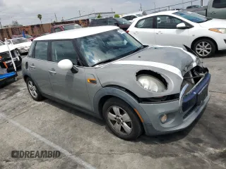 2015 MINI Hardtop 4 Door with VIN WMWXS5C56FT828846, listed as a Copart auction lot 54943765 with 78,964 mi miles and Salvage Title. Bid and sale history available at DreamBid. Image 4.