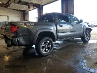 2019 Toyota Tacoma SR z VIN 3TMCZ5AN8KM197011, wystawiony jako Copart lot #56198675 z przebiegiem 117 363 mil mil oraz Szkoda całkowita • Salvage title. Historia ofert i sprzedaży dostępna na DreamBid. Obrazek 3.