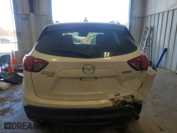 2015 Mazda CX-5 Grand Touring with VIN JM3KE4DY5F0538016, listed as a Copart auction lot 52396685 with 137,272 mi miles and Clean Title. Bid and sale history available at carsss.com. Image 6.