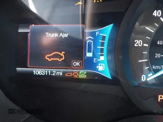 2016 Ford Fusion SE Hybrid with VIN 3FA6P0LU1GR385184, listed as a IAAI auction lot 39230513 with 106,311 mi miles. Bid and sale history available at carsss.com. Image 7.