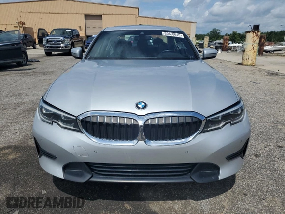 2020 BMW 3 Series 330i with VIN WBA5R1C07LFH40014, listed as a Copart auction lot 60656645 with 76,392 mi miles and Clean title. Bid and sale history available at DreamBid. Image 5.