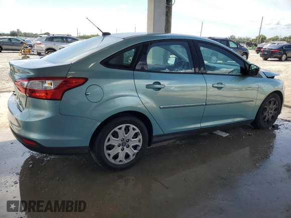2012 Ford Focus SE с VIN 1FAHP3F21CL254804, выставлен на аукционе Copart как лот 59048665 с пробегом 117 566 миль миль и Списание • Salvage title. История ставок и продаж доступна на DreamBid. Изображение 3.