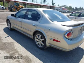 2002 Nissan Maxima GXE z VIN JN1DA31D92T207069, wystawiony jako IAAI lot #42439722 z przebiegiem 188 502 mil mil oraz . Historia ofert i sprzedaży dostępna na DreamBid. Obrazek 3.
