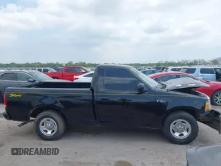 2001 Ford F-150 XL с VIN 1FTZF17241NA62251, выставлен на аукционе IAAI как лот 42051952 с пробегом 167 431 миль миль и . История ставок и продаж доступна на DreamBid. Изображение 13.