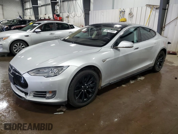 2014 Tesla Model S 60 with VIN 5YJSA1H15EFP51239, listed as a Copart auction lot 59214485 with 153,554 mi miles and Salvage title. Bid and sale history available at DreamBid. Image 1.