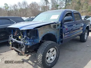 2014 Toyota Tacoma with VIN 3TMLU4EN0EM153558, listed as a IAAI auction lot 41964890 with 140,864 mi miles and . Bid and sale history available at DreamBid. Image 18.