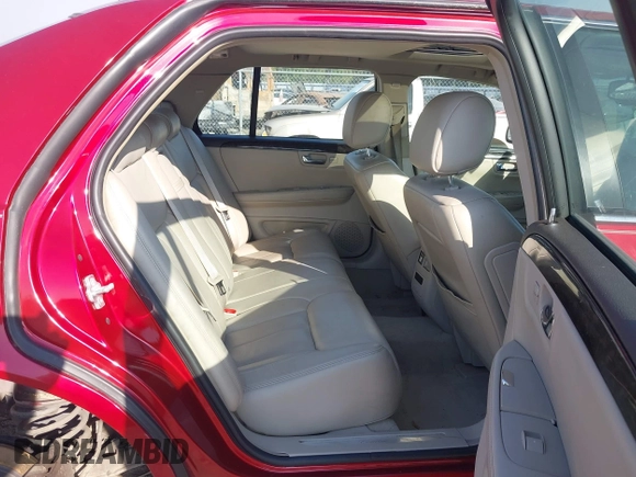 2008 Cadillac DTS 1SC with VIN 1G6KD57Y08U143396, listed as a IAAI auction lot 40618555 with 124,706 mi miles and . Bid and sale history available at carsss.com. Image 8.