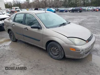 2003 Ford Focus LX with VIN 1FAFP33P33W267575, listed as a IAAI auction lot 41804406 with 106,957 mi miles and . Bid and sale history available at carsss.com. Image 1.