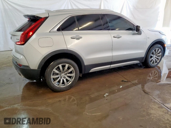 2022 Cadillac XT4 FWD Premium Luxury with VIN 1GYFZCR47NF100232, listed as a Copart auction lot 54520405 with 68,819 mi miles and Clean title. Bid and sale history available at DreamBid. Image 3.