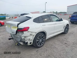 2019 BMW X4 xDrive30i with VIN 5UXUJ3C52KLG54945, listed as a IAAI auction lot 42083434 with 153,956 mi miles and . Bid and sale history available at DreamBid. Image 4.