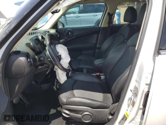 2016 MINI Countryman S with VIN WMWZC3C53GWT08355, listed as a Copart auction lot 53240215 with 62,674 mi miles and Salvage Title. Bid and sale history available at DreamBid. Image 7.