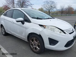 2013 Ford Fiesta S with VIN 3FADP4AJ5DM213417, listed as a IAAI auction lot 42023314 with 65,261 mi miles. Bid and sale history available at carsss.com. Image 6.