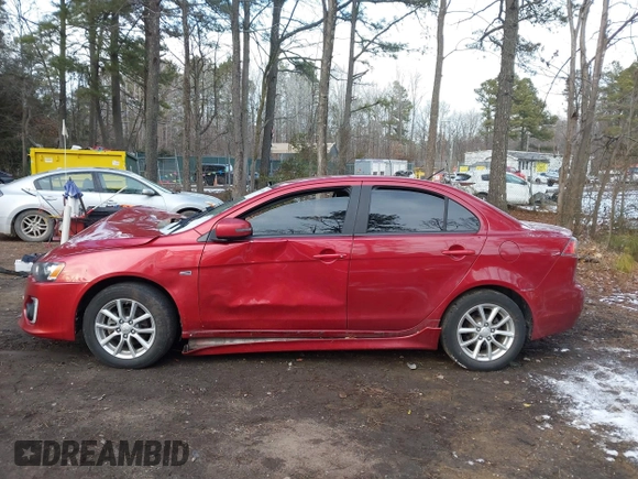 2016 Mitsubishi Lancer SE with VIN JA32V2FW7GU004159, listed as a IAAI auction lot 41401386 with 100,536 mi miles. Bid and sale history available at carsss.com. Image 13.