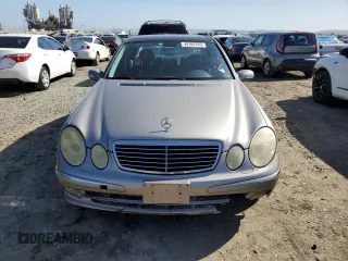 2003 Mercedes-Benz E-Class 5.0L with VIN WDBUF70J43A141846, listed as a Copart auction lot 49706765 with 199,428 mi miles and Salvage Title. Bid and sale history available at carsss.com. Image 5.