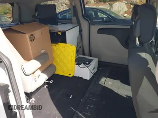 2019 Dodge Grand Caravan SE with VIN 2C4RDGBG8KR646829, listed as a IAAI auction lot 42136947 with 73,015 mi miles and . Bid and sale history available at DreamBid. Image 8.