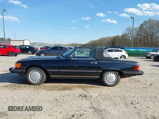 1986 Mercedes-Benz 560 Series 560SL with VIN WDBBA48D2GA055024, listed as a IAAI auction lot 41888928 with 118,569 mi miles. Bid and sale history available at carsss.com. Image 14.