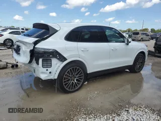 2023 Porsche Cayenne with VIN WP1AA2AY0PDA01300, listed as a Copart auction lot 56468895 with 32,576 mi miles and Salvage title. Bid and sale history available at DreamBid. Image 3.
