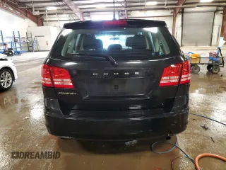 2013 Dodge Journey American Value with VIN 3C4PDCABXDT502334, listed as a Copart auction lot 58428235 with 162,009 mi miles and Clean title. Bid and sale history available at DreamBid. Image 6.