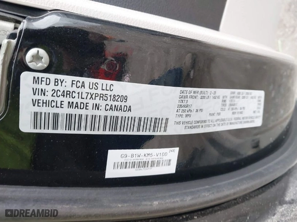 2023 Chrysler Pacifica Hybrid Touring L with VIN 2C4RC1L7XPR518209, listed as a IAAI auction lot 41038104 with 35,969 mi miles. Bid and sale history available at carsss.com. Image 9.
