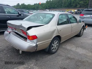 2000 Toyota Camry LE z VIN 4T1BF22K2YU094772, wystawiony jako IAAI lot #42427895 z przebiegiem 118 178 mil mil oraz . Historia ofert i sprzedaży dostępna na DreamBid. Obrazek 4.