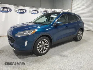2020 Ford Escape Titanium с VIN 1FMCU9J98LUA93393, выставлен на аукционе Copart как лот 65366925 с пробегом 74 750 миль миль и Чистый • Clean title. История ставок и продаж доступна на DreamBid. Изображение 1.